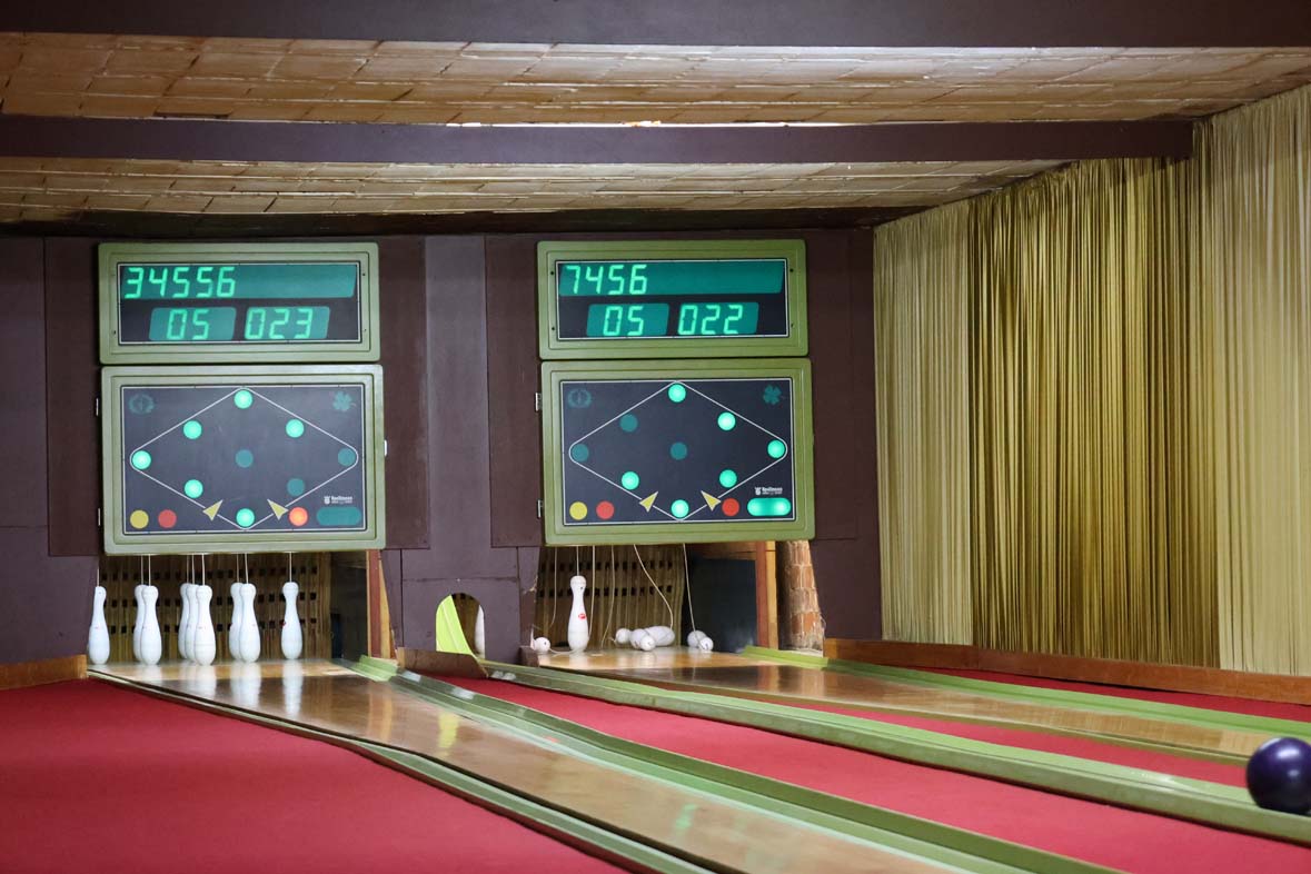 2 bowling alleys with scoreboards